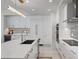 Sleek, modern kitchen featuring a large island, stainless steel appliances, and stylish backsplash at 301 1St S St # 2205, St Petersburg, FL 33701