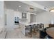 Open-concept kitchen with a large island, modern appliances, and comfortable dining area, ideal for Gathering gatherings at 301 1St S St # 2205, St Petersburg, FL 33701