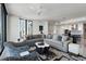 Spacious living area boasts large windows with stunning city views and comfortable seating at 301 1St S St # 2205, St Petersburg, FL 33701