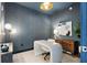 Stylish home office with modern desk, unique lighting, and sophisticated decor at 301 1St S St # 2205, St Petersburg, FL 33701