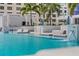 Inviting pool area includes submerged loungers and a stylish waterfall feature for ultimate relaxation and enjoyment at 301 1St S St # 2205, St Petersburg, FL 33701