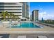Relaxing rooftop pool features sleek lounge chairs and cabanas, offering the perfect urban retreat at 301 1St S St # 2205, St Petersburg, FL 33701