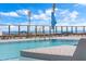 Inviting rooftop pool with lounge chairs, offering an ideal space for relaxation at 301 1St S St # 2205, St Petersburg, FL 33701
