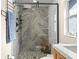 Modern bathroom featuring a walk-in shower with decorative tiling and glass door at 320 Lake Maggiore S Blvd, St Petersburg, FL 33705