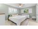 Comfortable main bedroom with shuttered windows, neutral paint, and ample natural light at 320 Lake Maggiore S Blvd, St Petersburg, FL 33705