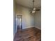 Bright bedroom with ceiling fan and entry to an outdoor balcony with water views at 3210 Mangrove Point Dr, Ruskin, FL 33570
