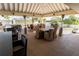 Relaxing outdoor seating area overlooking the water, perfect for enjoying the view at 3210 Mangrove Point Dr, Ruskin, FL 33570