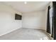Neutral bedroom with plush gray carpeting and prewired for a wall mounted television at 35168 Arya Way, Zephyrhills, FL 33541