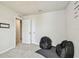 Bright bedroom with uplifting wall decor, two closets, and two plush beanbag chairs at 35168 Arya Way, Zephyrhills, FL 33541