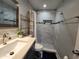 Chic bathroom with modern vanity, tiled shower, and neutral color palette creating a spa-like atmosphere at 4119 W Nassau St, Tampa, FL 33607