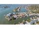 Scenic aerial view of a waterfront neighborhood showcasing its network of canals, homes, and beautiful surroundings at 4544 Harbor Hills Dr, Largo, FL 33770