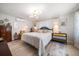 Bedroom with soft natural light, comfortable bed, and stylish decor elements at 4544 Harbor Hills Dr, Largo, FL 33770