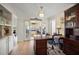 Home office with a large desk and built-in storage, providing an ideal workspace at 4544 Harbor Hills Dr, Largo, FL 33770