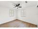 Bedroom with two windows offering natural light at 4613 Irene Loop, New Port Richey, FL 34652