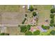 Expansive aerial view showcases property with mature trees and potential for development at 4615 Keene Rd, Plant City, FL 33565