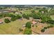 Extensive aerial view of diverse land with residences, farmland, and natural wooded areas at 4615 Keene Rd, Plant City, FL 33565