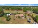 Expansive property with a cozy single-Gathering home and ample land, outlined in red, offering privacy and potential at 4615 Keene Rd, Plant City, FL 33565