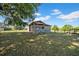 Barn featuring wood construction, shaded for animals in a rural setting at 4615 Keene Rd, Plant City, FL 33565