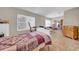 Comfortable bedroom with neutral walls and tiled flooring at 4615 Keene Rd, Plant City, FL 33565
