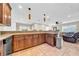 Spacious kitchen featuring granite countertops and ample cabinet space at 4615 Keene Rd, Plant City, FL 33565
