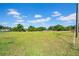Expansive plot of land with verdant grass under a vast sky at 4615 Keene Rd, Plant City, FL 33565