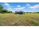 Spacious land with a weathered barn under a vast sky ready for building at 4615 Keene Rd, Plant City, FL 33565