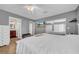This spacious main bedroom features tile floors and an en suite bathroom at 4615 Keene Rd, Plant City, FL 33565