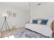 Bright bedroom with a daybed, rug, and stylish decor at 4859 Napoli Ne Ct # 4859, St Petersburg, FL 33703