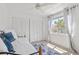 Bright bedroom with large closets and a sun-filled window at 4859 Napoli Ne Ct # 4859, St Petersburg, FL 33703