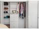 Organized closet with built-in shelving and ample storage space at 4859 Napoli Ne Ct # 4859, St Petersburg, FL 33703