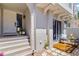 Cozy outdoor patio with decorative seating and stepping stones at 4859 Napoli Ne Ct # 4859, St Petersburg, FL 33703