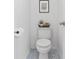 Cozy powder room featuring patterned tile flooring and modern fixtures at 4859 Napoli Ne Ct # 4859, St Petersburg, FL 33703
