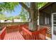 Backyard featuring a unique tree that goes through the deck at 5832 Sussex Dr, Tampa, FL 33615