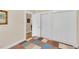 This bedroom features hardwood floors and a large closet for plenty of storage at 7701 N Dartmouth Ave, Tampa, FL 33604