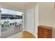 Access to screened in porch that offers a private and comfortable outdoor living space at 7701 N Dartmouth Ave, Tampa, FL 33604