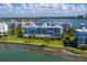 Waterfront condo community featuring manicured grounds, lush lawns, mature palms and stunning views at 8020 Sailboat Key S Blvd # 101, St Pete Beach, FL 33707
