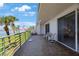 Patio featuring chairs and slider with views of a waterfront at 8020 Sailboat Key S Blvd # 101, St Pete Beach, FL 33707