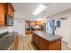 Kitchen with island and plenty of cabinet space at 8020 Sailboat Key S Blvd # 101, St Pete Beach, FL 33707