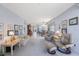 Cozy living room featuring carpet flooring and lots of seating at 8020 Sailboat Key S Blvd # 101, St Pete Beach, FL 33707
