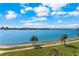 Expansive water view overlooking the city skyline, green space, and beautiful blue skies at 8020 Sailboat Key S Blvd # 101, St Pete Beach, FL 33707