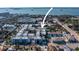 Aerial view of the neighborhood showcases the property's prime location near the water and the adjacent buildings at 946 Highland Ave # 23, Dunedin, FL 34698