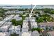Aerial view of the property highlights its location within the neighborhood with nearby water views at 946 Highland Ave # 23, Dunedin, FL 34698