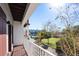 Outdoor balcony with railings overlooking the neighborhood at 946 Highland Ave # 23, Dunedin, FL 34698