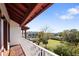 Outdoor balcony with railings overlooking the neighborhood, offering a relaxing view of the neighborhood at 946 Highland Ave # 23, Dunedin, FL 34698
