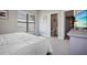 Bright bedroom with carpet, and an ensuite bathroom at 946 Highland Ave # 23, Dunedin, FL 34698