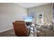 Comfortable living room with a recliner, neutral sofa, and entertainment center at 946 Highland Ave # 23, Dunedin, FL 34698