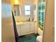 Bathroom featuring a vanity with storage, a bathtub, and a tiled shower at 9790 66Th N St # 346, Pinellas Park, FL 33782