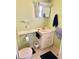 Small bathroom with linoleum flooring, updated vanity, and bright lighting at 9790 66Th N St # 346, Pinellas Park, FL 33782