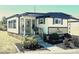 Charming single-story home with a covered front porch, landscaped yard and carport at 9790 66Th N St # 346, Pinellas Park, FL 33782