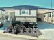 Charming single-story home with a covered front porch, carport and landscaped yard at 9790 66Th N St # 346, Pinellas Park, FL 33782